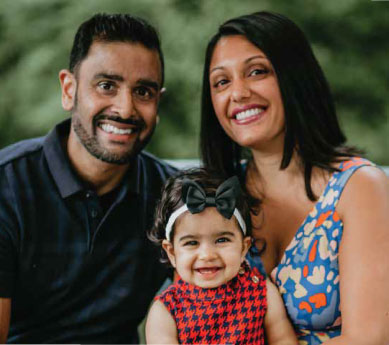 Sejal (right), with husband Chirag (left), and daughter Naia